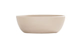 A simple, round, light beige 16 oz soup bowl with smooth sides and a matte finish, shown against a plain white background. The ceramic bowl is empty and features a minimalist, modern design.
