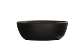 A matte black, round 16 oz. melamine soup bowl with smooth, curved sides is centered on a white background. The bowl has a wide opening and flat base, featuring a minimalist, modern design.