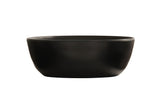 A matte black, round Carmel Soup Bowl with smooth sides and a slightly curved rim is shown against a plain white background. Made from durable melamine, this 30 oz. bowl features a simple, modern design and is empty.