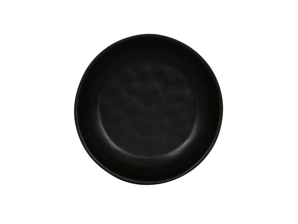 A round, empty black pasta bowl is centered against a plain white background. The bowl features a smooth, matte finish with subtle texture and no visible decorations or patterns.