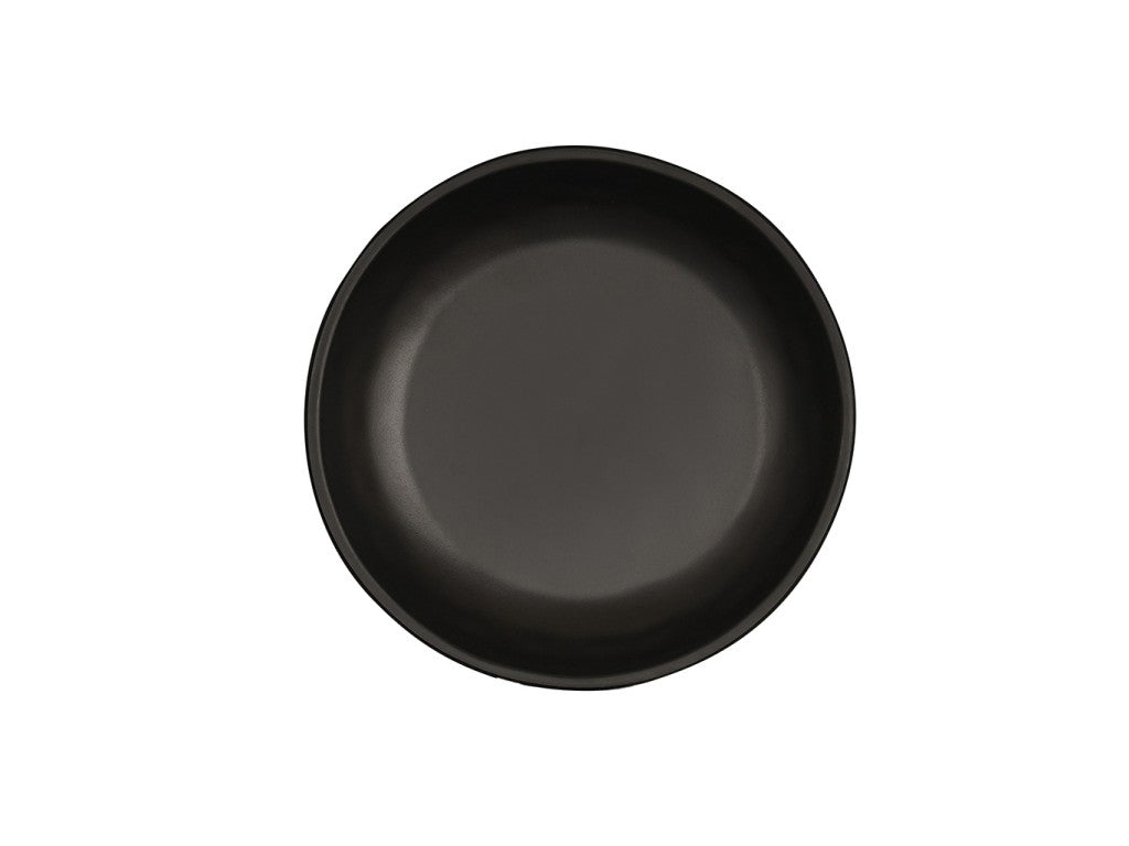 A plain, round, matte black Cal-Mil ceramic plate is centered on a white background. The plate has a smooth surface and slightly raised edges, with no decoration or patterns visible.