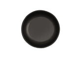A plain, round, matte black Cal-Mil ceramic plate is centered on a white background. The plate has a smooth surface and slightly raised edges, with no decoration or patterns visible.