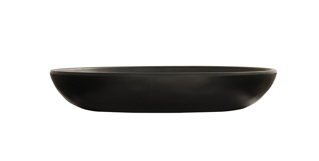 A matte black, shallow, oval-shaped pasta bowl is centered on a white background. The bowl features smooth, rounded edges and a minimalist design, with no visible patterns or decorations—perfect for modern dining.