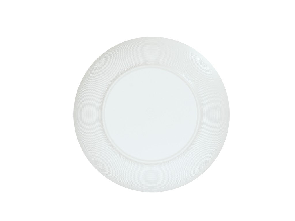 A plain white, round ceramic plate is shown from a top-down view against a white background. Similar in elegance to a Charlotte Bowl, it features a subtle textured rim and smooth, slightly recessed center with no visible patterns or decorations.