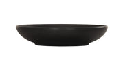 A matte black coupe bowl with a low, round shape, slightly flared rim, and fine horizontal ridges around the exterior. The Charlotte Bowl sits on a small, flat base and is photographed against a plain white background.