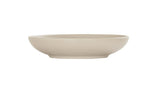 A beige, shallow Charlotte Bowl with a wide, round shape and subtle horizontal ridges around the exterior. The bowl sits on a small, slightly raised base and is photographed against a plain white background.