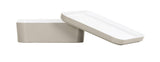 Two rectangular white ceramic containers, reminiscent of a Bento Box, are shown; one lies flat while the other stands diagonally, partially overlapping. Both feature smooth surfaces and rounded edges, displayed elegantly on a white background.