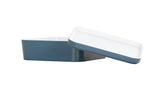 A rectangular, blue and white ceramic baking dish is shown with a matching lid. The dish, which is dishwasher safe, has straight sides and rounded edges. The lid is partially lifted at an angle on top of the dish against a plain white background.