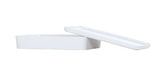 A rectangular white ceramic Bento Box with a matching flat lid. The box is open, its lid angled and resting beside it. Both pieces have smooth surfaces and minimalistic lines, set against a plain white background.