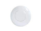A white, round melamine bowl is shown from above against a plain white background. The bowl has a smooth, glossy surface and a slightly raised circular base in the center. The lighting highlights its shiny finish.