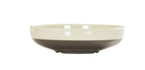 A shallow, round Vienna Bowl with a wide rim features a cream upper half and dark brown lower half. This dishwasher safe bowl sits on a small, slightly raised base against a plain white background.