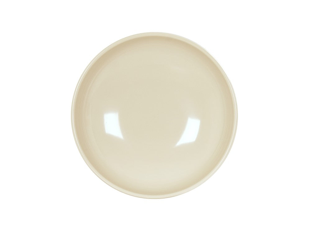 A round, empty, beige ceramic Vienna Bowl is viewed from above against a white background. The plate has a smooth, glossy finish with reflections of light visible on its surface and is dishwasher safe for easy cleaning.