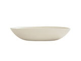 A plain, off-white, oval-shaped Bali Pasta Bowl with smooth, curved edges is shown against a white background. Made from melamine, this minimalistic bowl features a slightly irregular rim and is dishwasher safe for easy cleaning.
