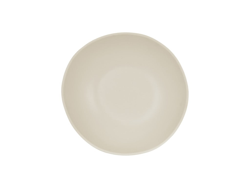 A top-down view of a simple, round Bali Pasta Bowl with smooth, slightly irregular edges, set against a plain white background. The off-white melamine bowl appears empty with a matte finish and is dishwasher safe for easy cleaning.