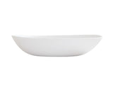 A white, oval-shaped Bali Pasta Bowl with smooth, slightly curved sides and a minimalist design, shown from the side against a plain white background; this ceramic bowl is also dishwasher safe for easy cleaning.