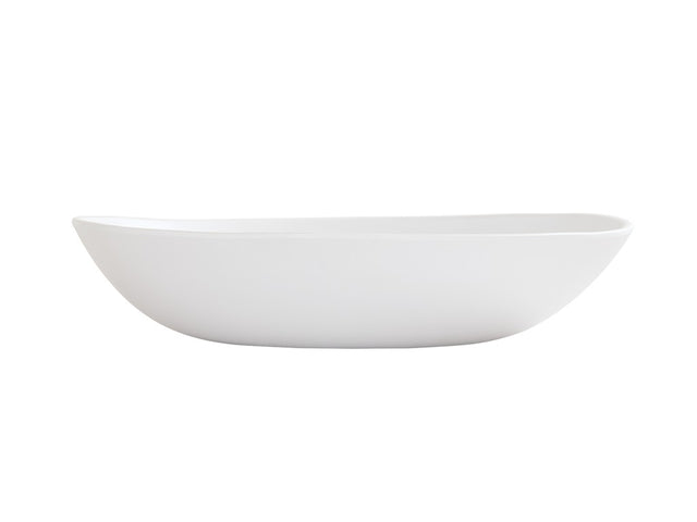 A white, oval-shaped Bali Pasta Bowl with smooth, slightly curved sides and a minimalist design, shown from the side against a plain white background; this ceramic bowl is also dishwasher safe for easy cleaning.