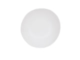 A plain, round white Bali Pasta Bowl is centered on a white background. The bowl is empty and appears smooth and clean, with slightly uneven, organic edges. Dishwasher safe, its minimalist style dominates the image.