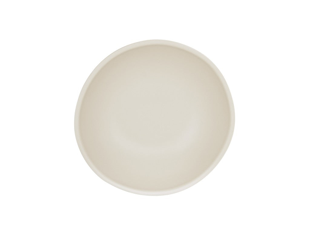 A plain, off-white Bali Pasta Bowl is shown from above against a white background. The bowl has a smooth, minimalist design with slightly uneven, organic edges and is dishwasher safe for easy cleaning.