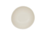 A plain, off-white Bali Pasta Bowl is shown from above against a white background. The bowl has a smooth, minimalist design with slightly uneven, organic edges and is dishwasher safe for easy cleaning.