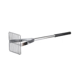 A metal grill scraper with a flat rectangular head made of parallel metal bars and a cool touch handle, partly covered with black plastic for grip, is shown on a white background. The chrome plated tool appears clean and unused.
