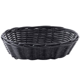 A round, shallow basket made of black polypropylene woven to mimic wicker. The basket features a hand-woven look with horizontal and vertical strips, an open design, and a slightly raised, wavy edge against a plain white background.