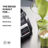 A green smoothie is being poured from a 1.4 liter copolyester container Bar Blender into two clear cups, one topped with seeds, oats, and coconut. Text on the left reads: “THE BB320 IS BUILT FOR… BLENDED COCKTAILS, MOCKTAILS, SMOOTHIES.” Perfect for international use.