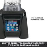 Close-up of an Xtreme Series Blender base, showcasing a digital control panel with buttons 1 to 4 for programmable beverage stations. Text below highlights a limited three-year motor warranty and two-year parts and labor on this powerful 3.5 HP blender.