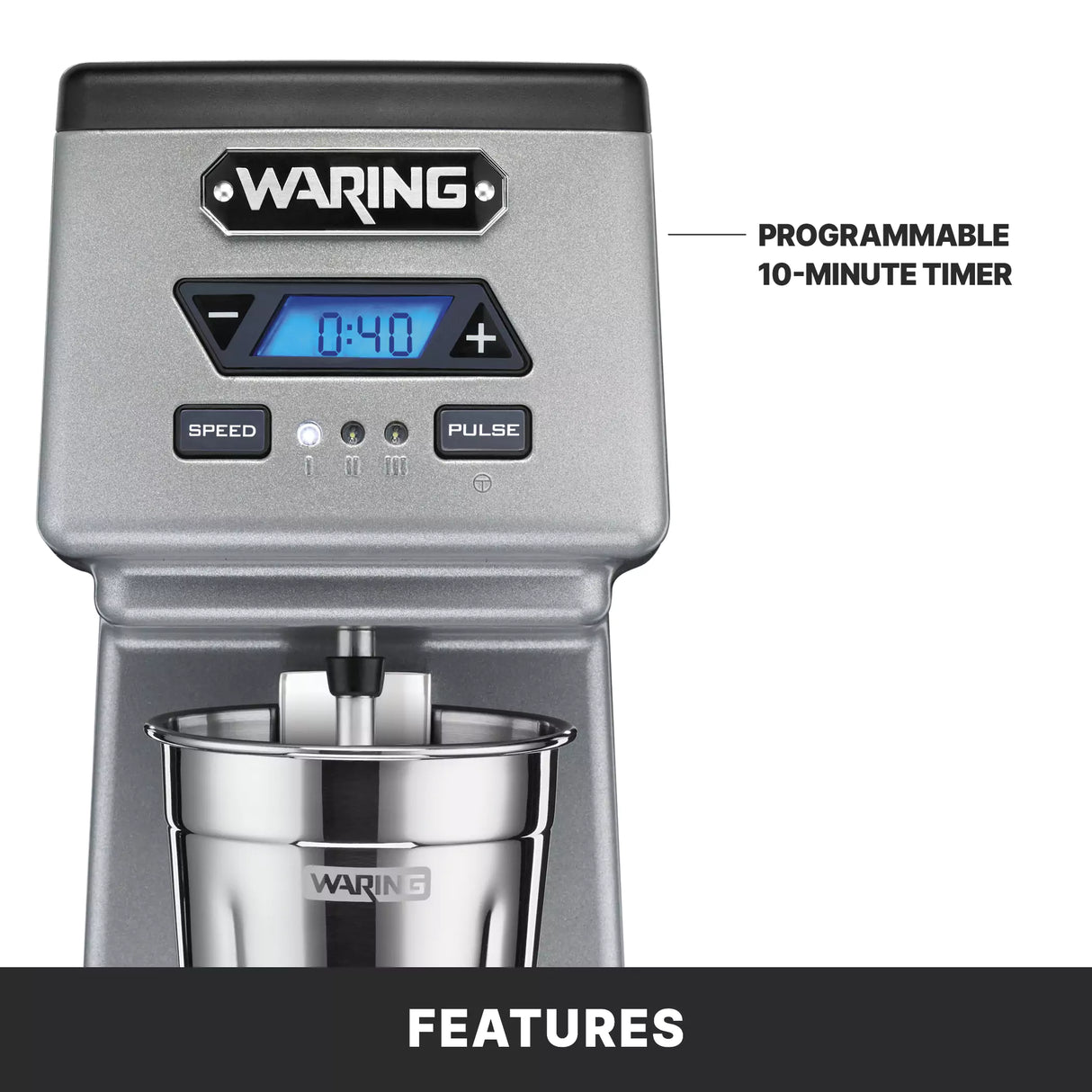 Close-up of a Waring WDM120TX Drink Mixer. The control panel shows a digital timer set to 0:40 and buttons for speed, plus, minus, and pulse. A single spindle metal mixing cup is in place. Text reads: PROGRAMMABLE 10-MINUTE TIMER. Bottom banner: FEATURES.