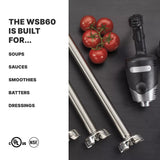A heavy-duty Immersion Blender with three detachable stainless steel shafts is displayed on a dark surface next to fresh red tomatoes. Text on the left reads: “BUILT FOR SOUPS, SAUCES, SMOOTHIES, BATTERS—IDEAL FOR 100 QT CAPACITY.” UL and NSF logos appear below.