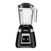 A black Waring Commercial bar blender with a clear, marked copolyester container, handle on the right, and a black lid. The base features two switches labeled Off, Low, and High, and a “Blade” logo centered below the switches.