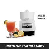 A white Bar juicer labeled “JUICE 120 ORANGES PER HOUR” sits beside a glass of orange juice garnished with lime, half an orange, lemon, and lime, all on a white background. Below, bold text reads, “LIMITED ONE-YEAR WARRANTY.”.