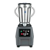 A commercial blender with a 3.75 HP motor features a stainless steel container, two side handles, and sits on a sturdy black base with digital controls and an LED display. The modern, industrial design is labeled “Waring” at the top of the jar.