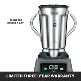 A heavy-duty, commercial-grade Food Blender with two handles and labeled “CB15 The Legend.” Text reads “Blend 100+ drinks a day.” A black banner at the bottom says “LIMITED THREE-YEAR WARRANTY.” The blender appears sturdy and professional.