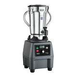 A heavy-duty food blender with a stainless steel jar, two side handles, and a black base. The base has green and red buttons, a variable-speed central knob labeled “CB15,” and stands firmly on four sturdy legs.