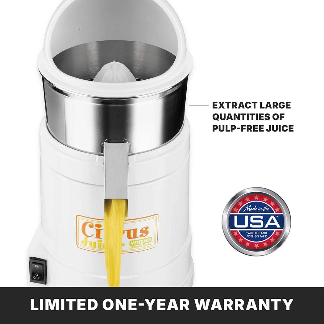 A white heavy duty electric citrus juicer dispenses yellow juice from its spout. Text reads EXTRACT LARGE QUANTITIES OF PULP-FREE JUICE. A USA seal, LIMITED ONE-YEAR WARRANTY, power switch, and Citrus Juicer label are on the front.
