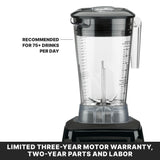 A heavy duty blender with a BPA free container and measurement markings, labeled “RECOMMENDED FOR 75+ DRINKS PER DAY.” Below, text reads: “LIMITED THREE-YEAR MOTOR WARRANTY, TWO-YEAR PARTS AND LABOR.” The background is plain white.