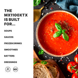 A bowl of bright red tomato soup garnished with basil sits on a dark table beside sliced bread and fresh tomatoes. On the left, bold text reads: The MX1100XTX High-Power Blender is built for... Soups, Sauces, Frozen Drinks, Smoothies, Batters, Dressings.