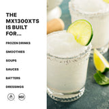 Two glasses of frozen drinks garnished with lime slices and a salted rim sit on a light surface. Text on the left lists uses for the MX1300XTS high-power blender: frozen drinks, smoothies, soups, sauces, batters, and dressings. Two certification icons are below.