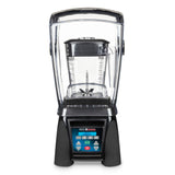 A high-power commercial blender with a clear sound enclosure, large measurement-marked pitcher, black base, and digital control panel with multiple buttons and display screen, shown against a plain white background.