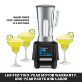A silver and black bar blender with a stainless steel container sits on a countertop, surrounded by three margarita glasses filled with yellow frozen margaritas, each garnished with a lime slice. Text above reads: “Blend three 16 oz. margaritas in 8 seconds.” Warranty details below.