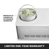 A stainless steel and white Ice Cream Maker with built-in compressor churns green-flecked ice cream in an open canister. Text highlights its 2 qt. capacity and ability to make ice cream in 30 minutes. A banner below reads, Limited one-year warranty.