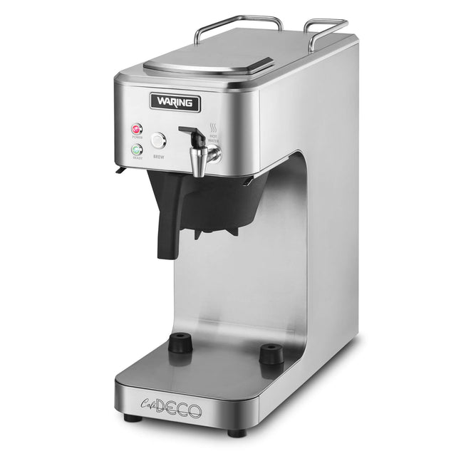 A stainless steel Waring commercial coffee maker with a modern, café deco-inspired rectangular design. It features indicator lights, a brew button, black filter holder, large cup space below the dispenser, and the Waring logo on the front.