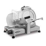 A silver electric food slicer with a circular serrated blade, transparent safety guard, and sliding tray. This Commercial Food Slicer features a black control knob for adjustable slice thickness and the “WARING” label on the side.