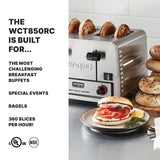 A stainless steel Waring 4 slice commercial bagel toaster sits on a counter, toasting bagels. In front, a plate holds a toasted bagel with cream cheese, tomato, onion, and herbs. Text highlights the heavy-duty toaster’s features and 360 slices per hour capacity.