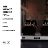 A stainless steel Waring coffee warmer with a double burner and two glass coffee pots filled with coffee sits on a dark surface. Text on the left reads: The WCW20 is built for... Restaurants, Cafés, Diners, Catered Events. NSF and safety icons are below.