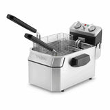 The Waring WDF1000 is a stainless steel countertop electric fryer with a black handle and control panel, featuring two wire baskets with black handles inside. It sits on a white surface, and its control panel includes dials and indicator lights.
