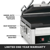 A stainless steel Dual Surface Panini Grill with a ridged hinged top plate, heat-resistant handles, and adjustable back feet. Text labels highlight these features. A black bar at the bottom reads, LIMITED ONE-YEAR WARRANTY in bold white letters.