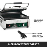 A stainless steel Dual Surface Panini Grill with a removable drip tray is shown. Below it, a heavy-duty grill brush with scraper appears. Black text highlights features and a caption reads: INCLUDED WITH WDG250T on a black background.