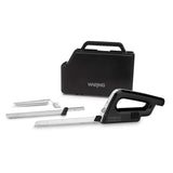 A black and silver electric carving knife set with two serrated blades, a carving fork, and a black carrying case labeled Waring. The knife handle and blades are arranged in front of the closed case on a white background.