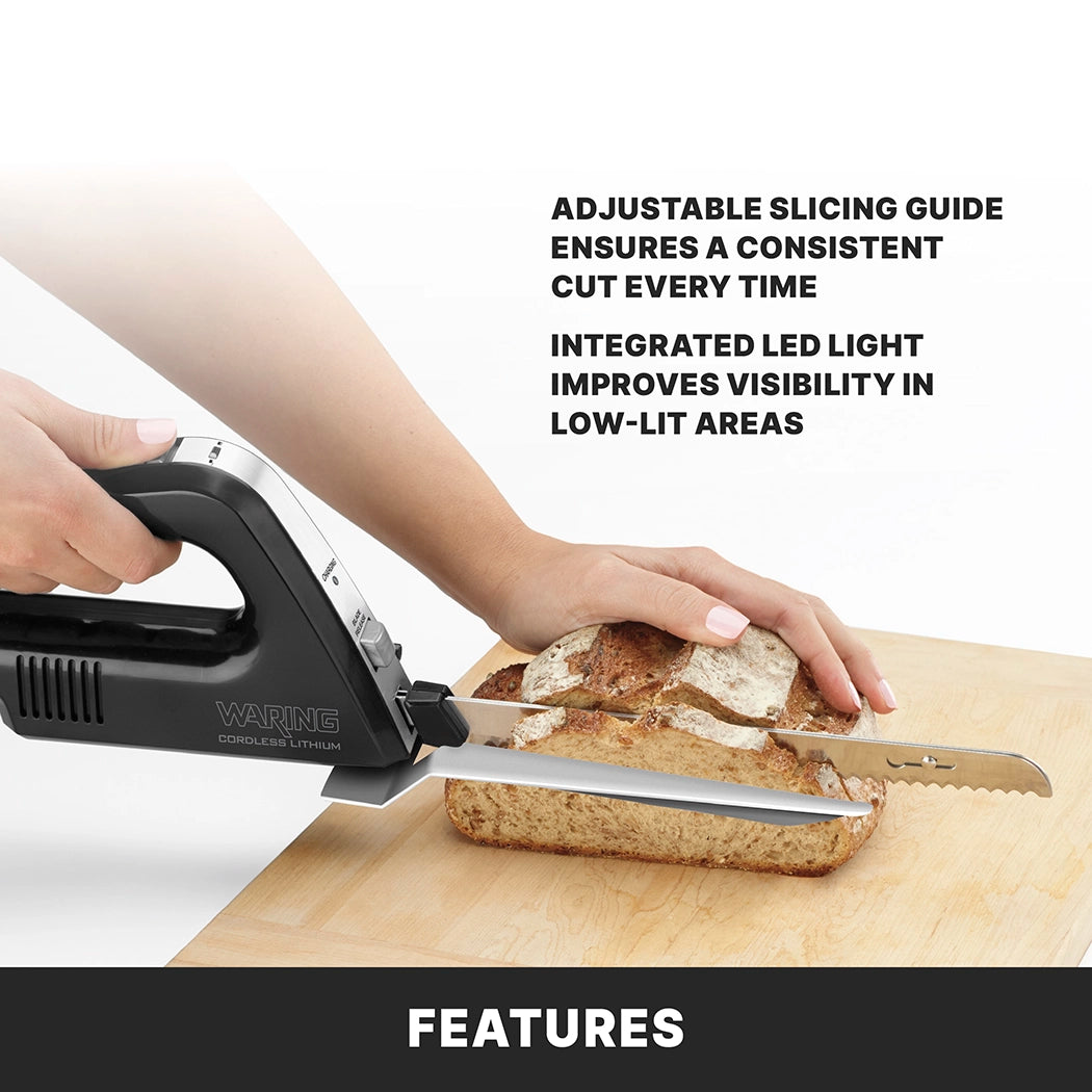 A person uses a Waring cordless carving knife with a serrated blade to slice bread on a wooden cutting board. Text highlights the adjustable slicing guide and integrated LED light for better visibility.